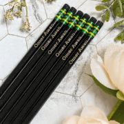 Personalized engraved pencil on notebook and desk β unique office supplies and corporate stationery gift